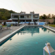 Luxus-Ferienvilla Topazi Korfu Ferienhaus anwesen mieten griechenland privat pool meerblick sandstrand exklusiv modern seafront modern gehoben premium traumhaft sandstrand luxusreisen